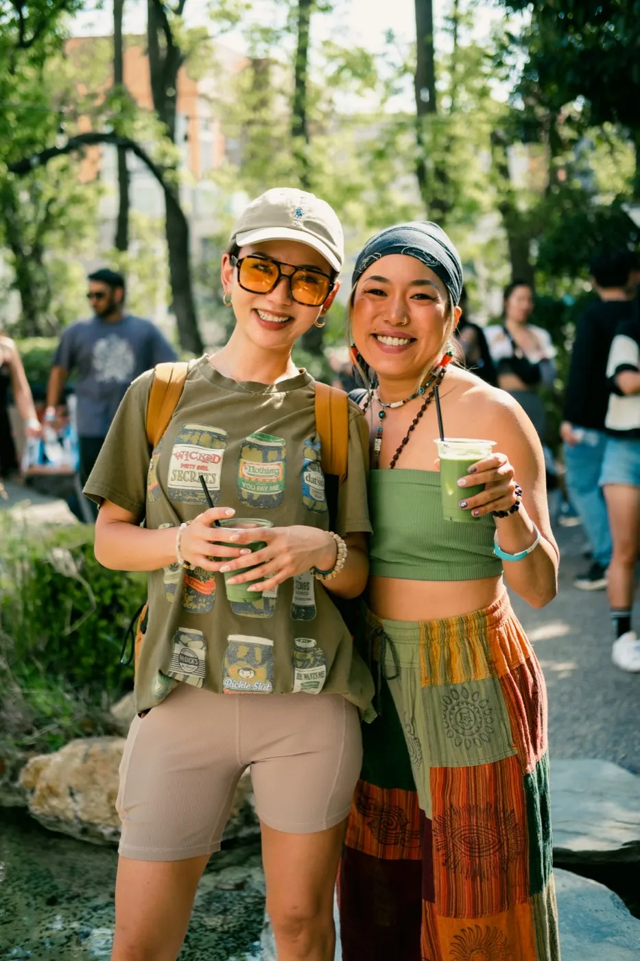 Two women laughing together mid-conversation