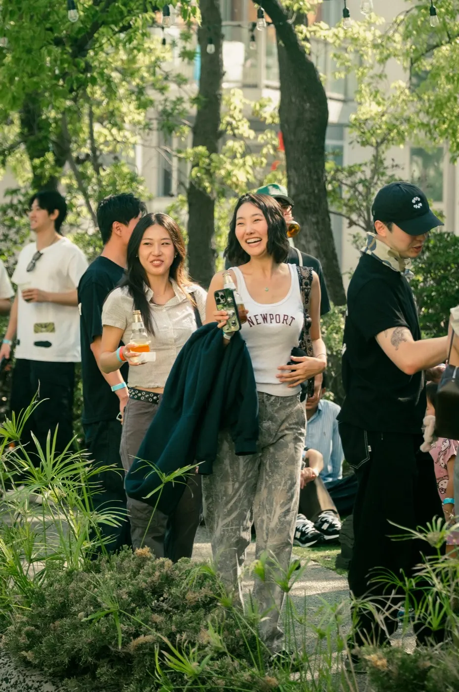 Guests walking and laughing together through the crowd