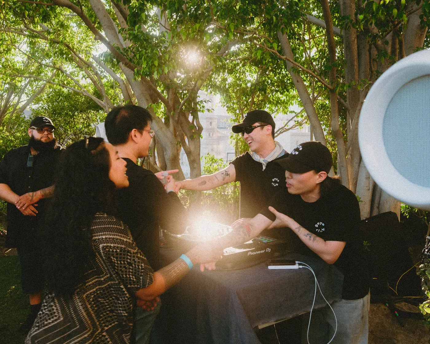 Guests gathered around the booth as the sun drops