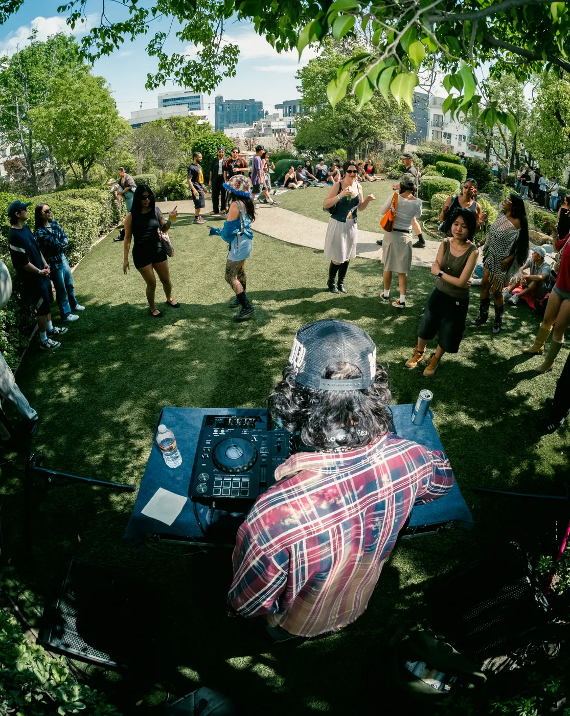 The DJ booth seen across the garden pond