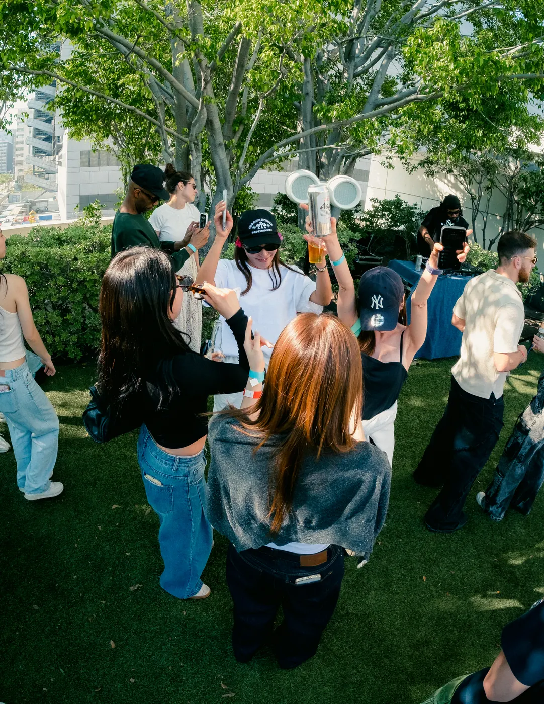 Crowd dancing under the garden trees
