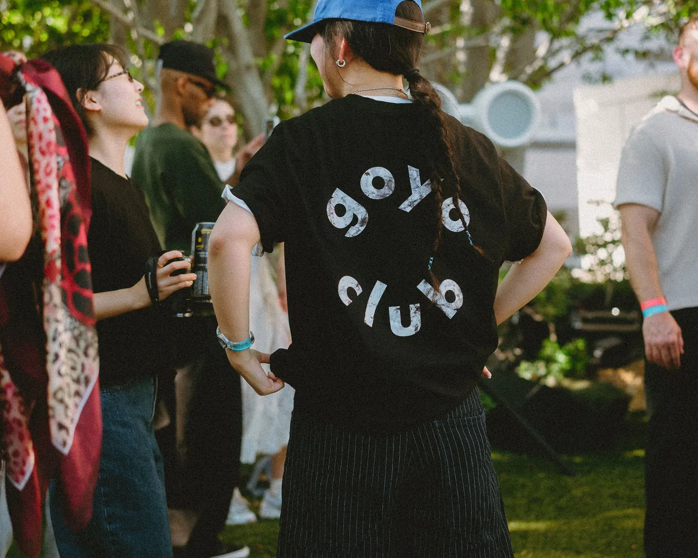 Back of a goyo club tee in the crowd