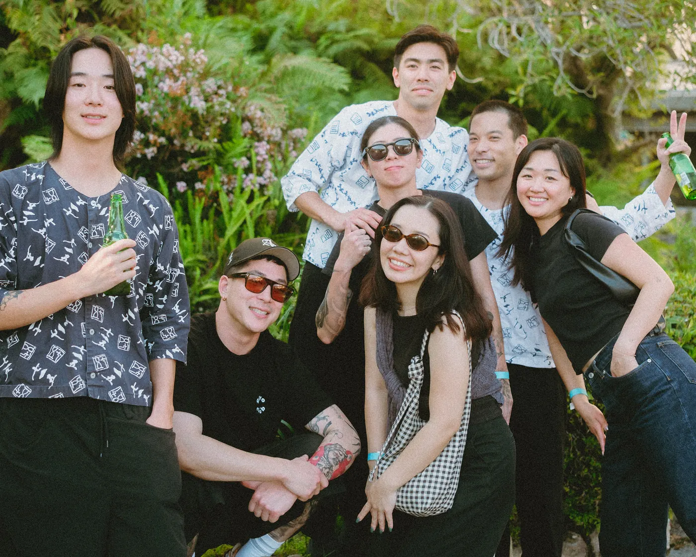 Group of friends posing together in the garden