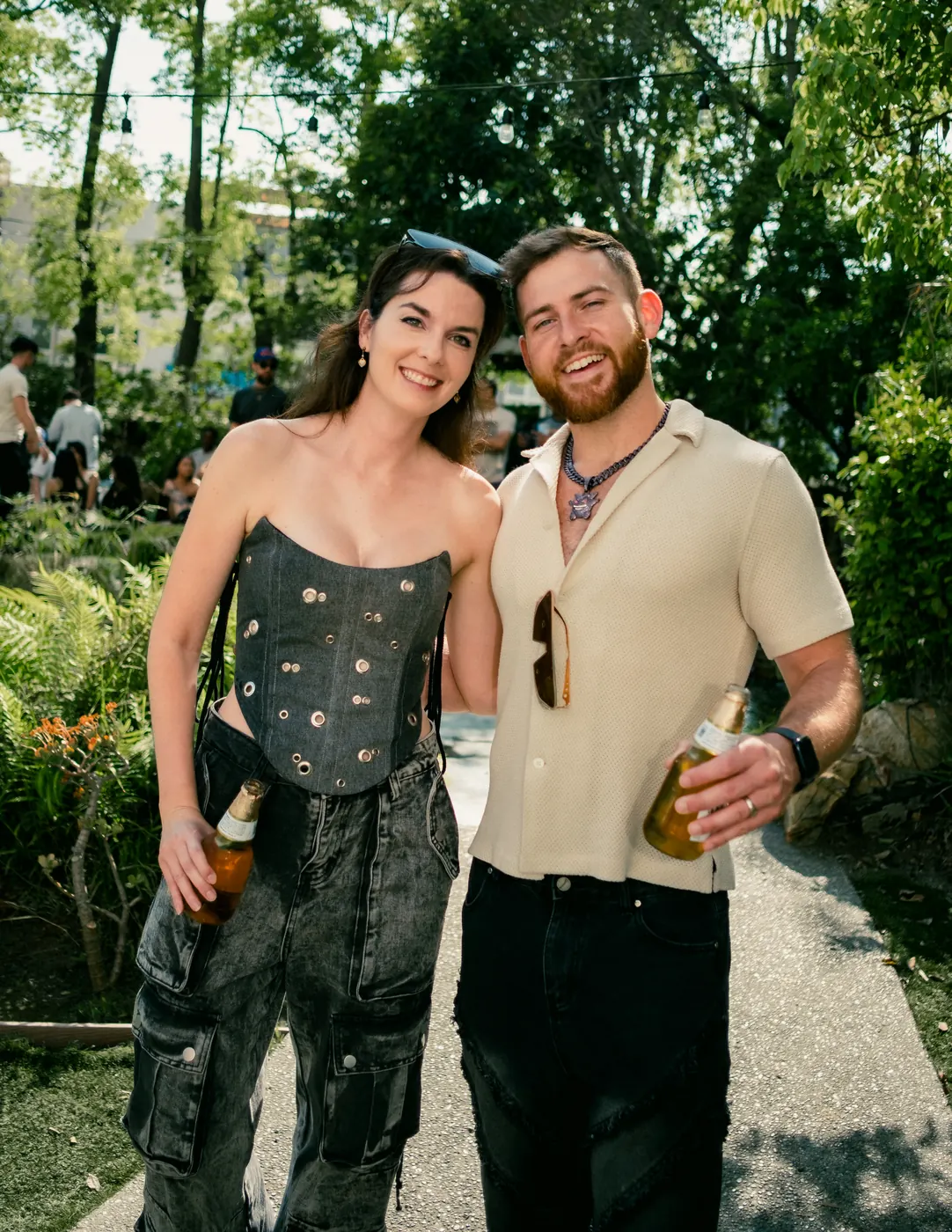 Couple posing on the garden walkway